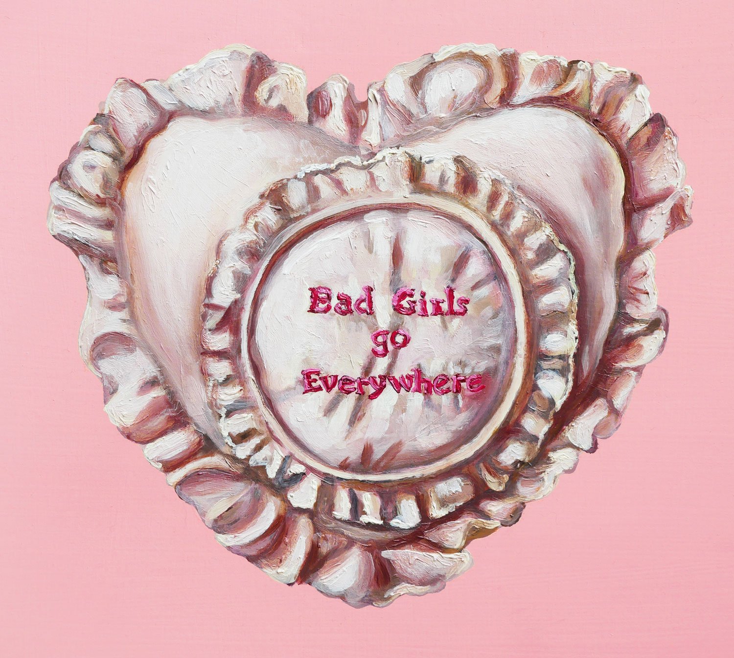 Light pink oil painting of a heart-shaped pillow with 'Bad Girls Go Everywhere' embroidered on it.